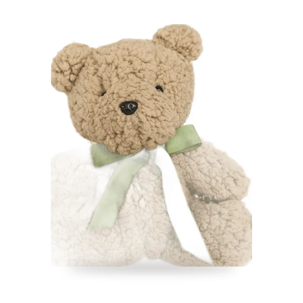 Urso de pelúcia com rosa